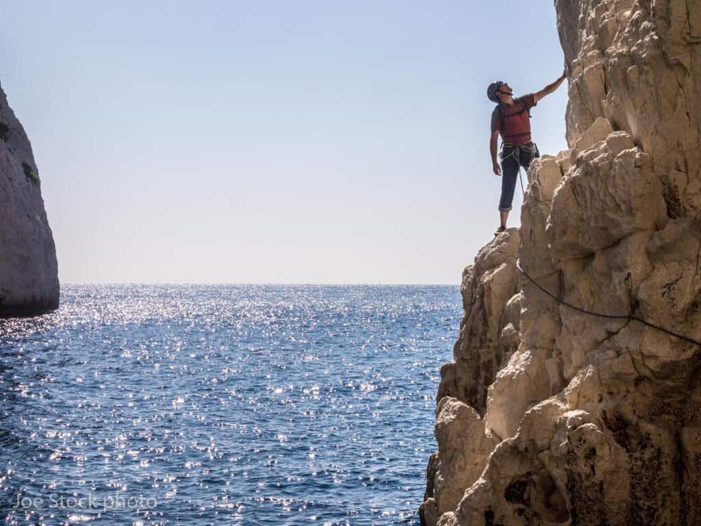 Climbers by the sea in the Calanques